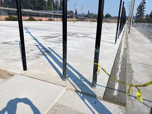 concrete with posts sticking up