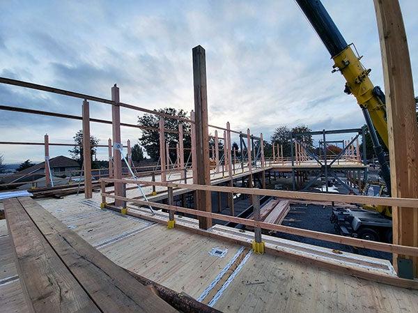 wooden beams and decking of a partially built structure