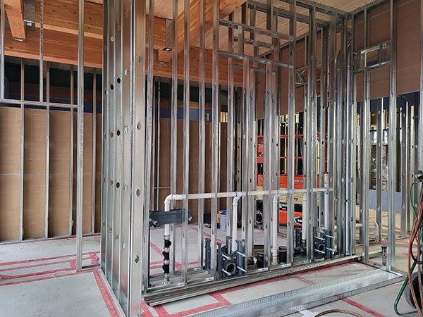 interior of a building under construction with metal framing